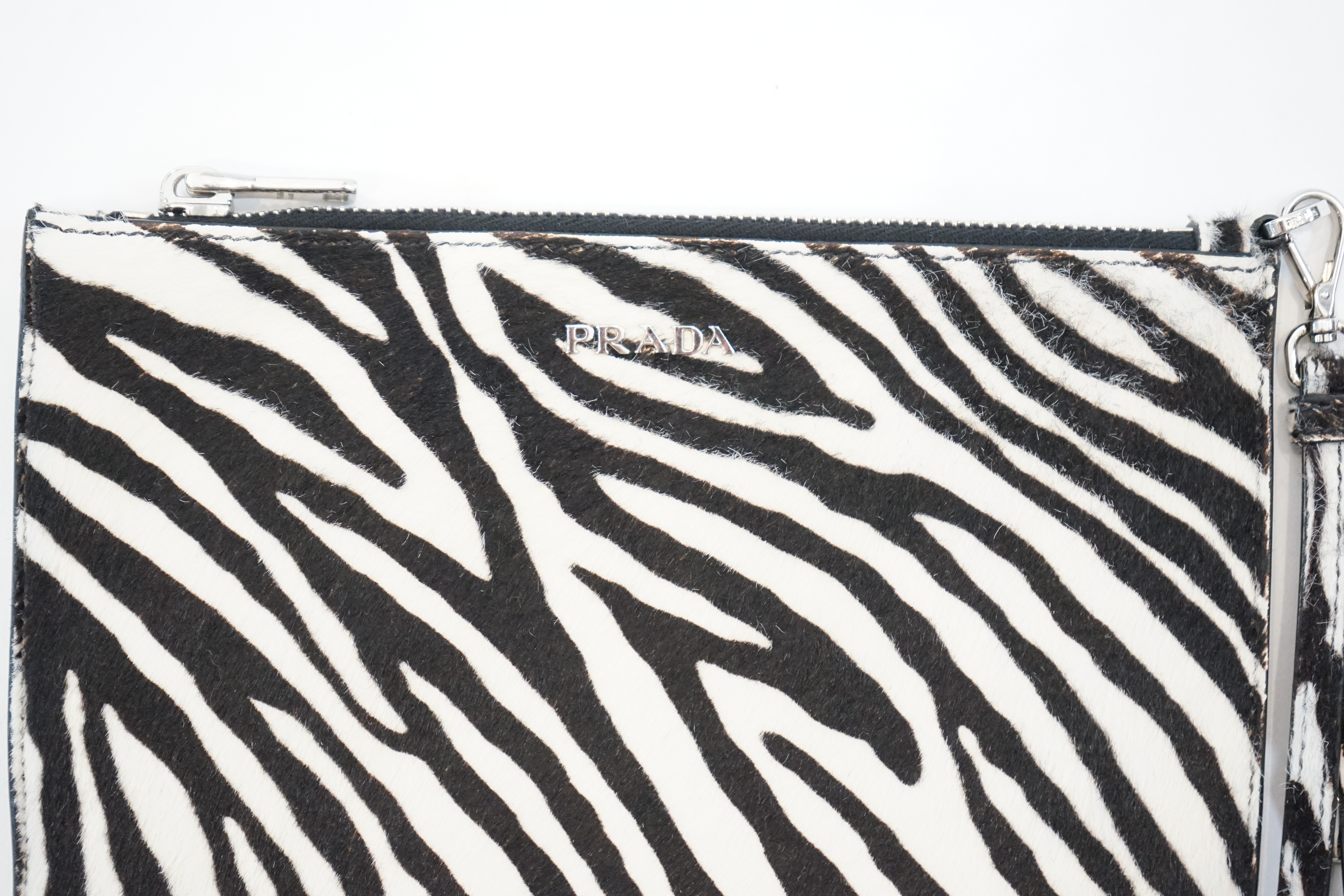 A Prada zebra print pony skin purse bag, width 21cm, height 13cm